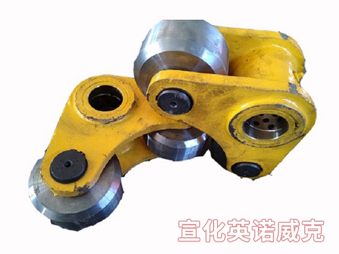 debricking machine boom roller assembly