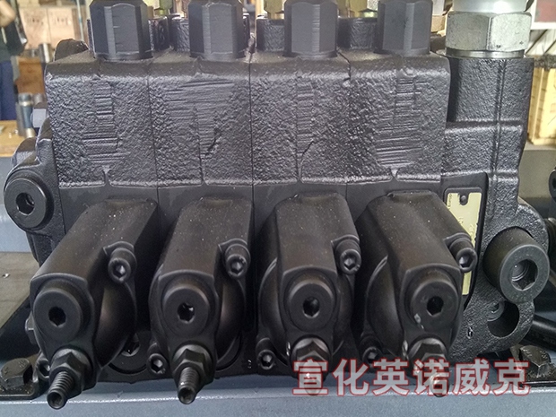 Multi way valve and distributor for furnace dismantling machine